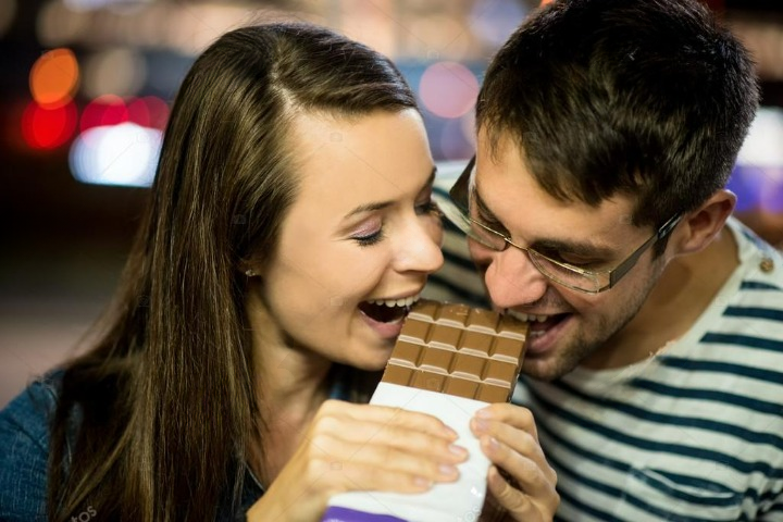 chocolate recipe, valentines day depositphotos 62137823 stock photo couple eating chocolate on date cleanup